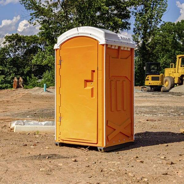 what is the cost difference between standard and deluxe portable toilet rentals in Aroda